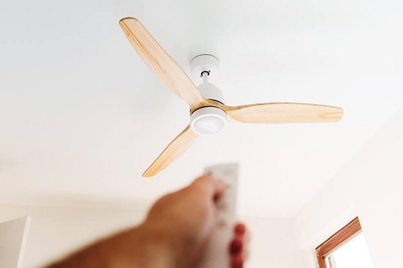 How to Choose the Right Ceiling Fan for Your Space. A remote controlled fan.